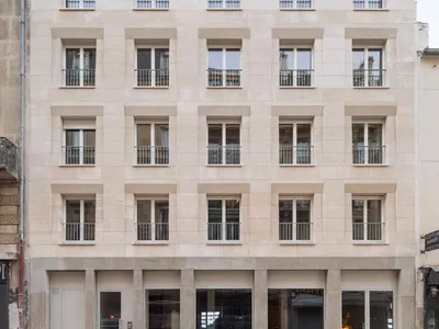 Immeuble de 17 logements sociaux en pierre massive à Paris - Barrault Pressacco (2018)
